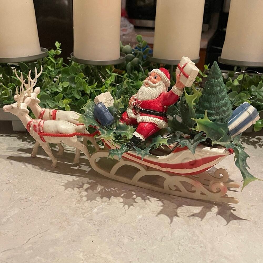 Vintage blow mold Santa waving a gift sitting in his sleigh &reindeer Hong Kong
